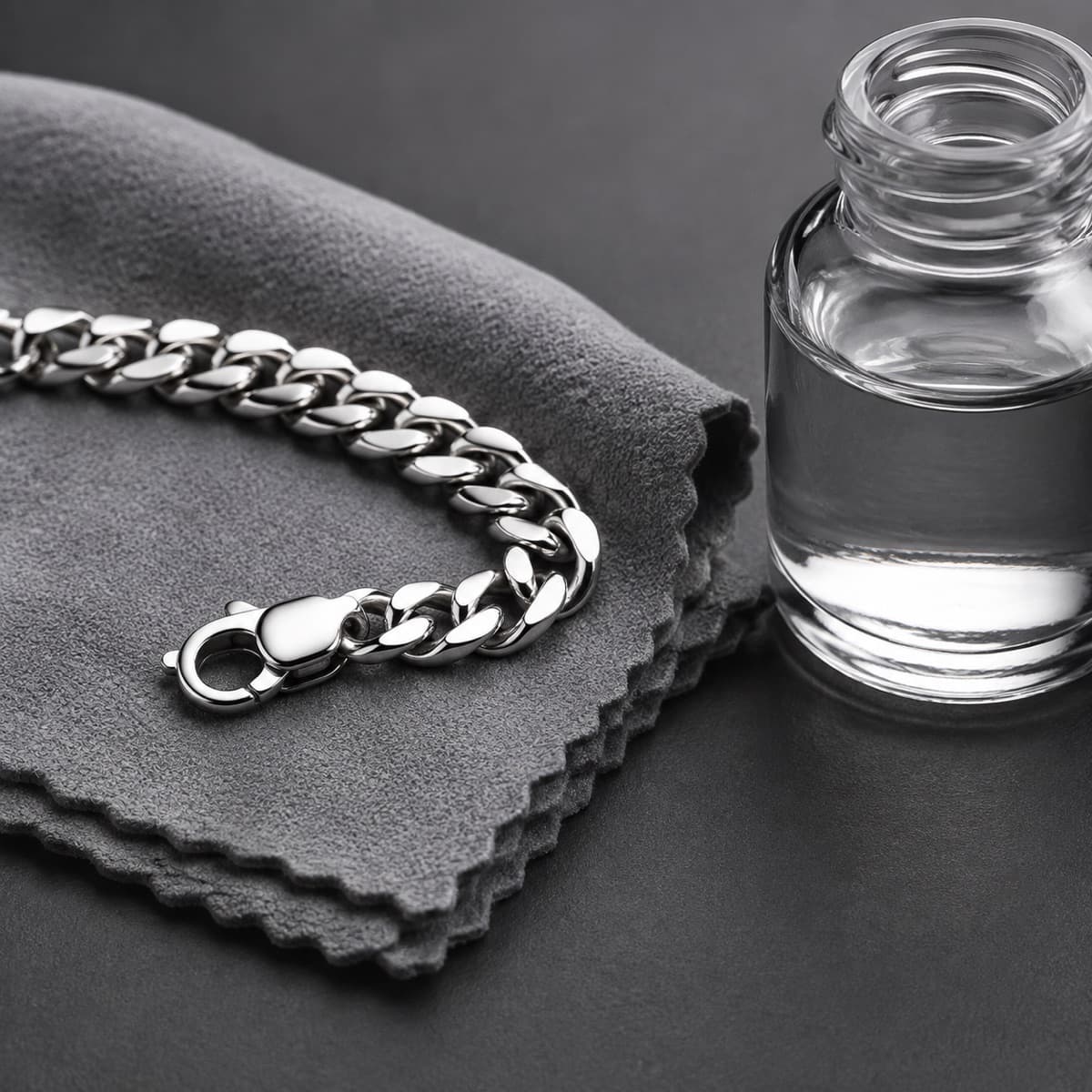 Silver Care Kit in solid 925 sterling silver, photographed against a dark grey background